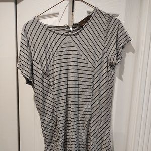 Fenn Wright Manson: Gray and black striped top with zipper on the back